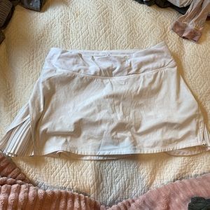 white side pleated lululemon skirt